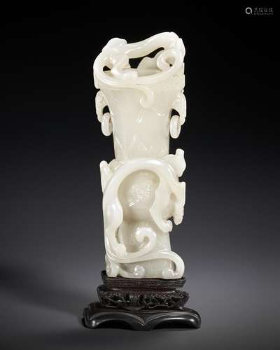 A SMALL WHITE JADE 'DRAGON’ VASE