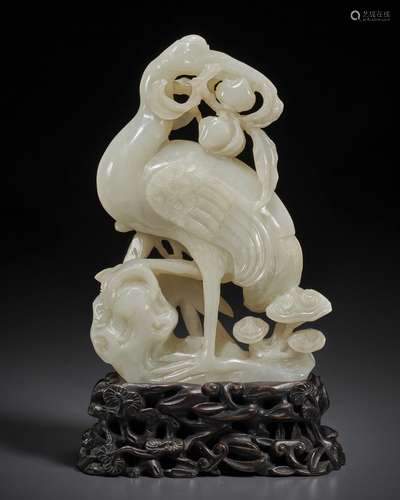 A WHITE JADE CARVING OF A CRANE