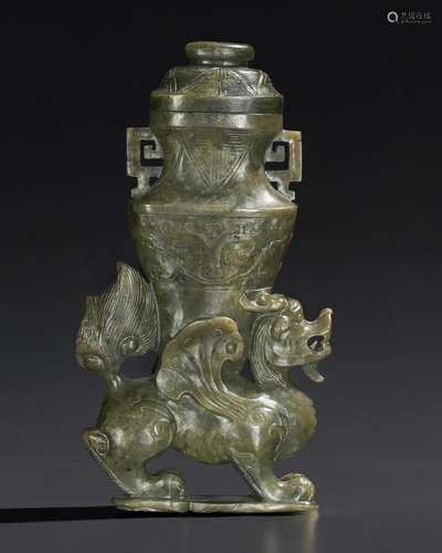 A GREEN JADE 'MYTHICAL BEAST' VASE AND A COVER