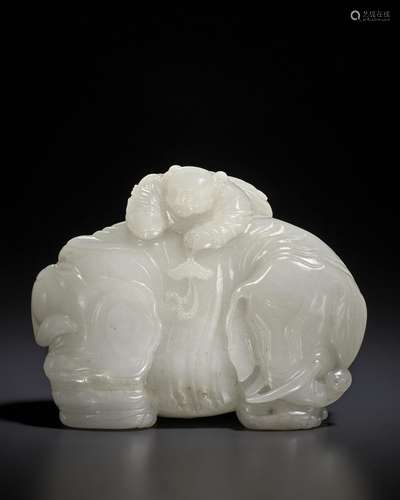 A CREAMY WHITE JADE FIGURE OF AN ELEPHANT