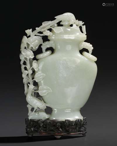 A PALE GREENISH-WHITE JADE FLATTENED BALUSTER VASE AND COVER