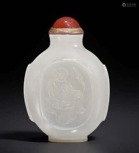 A CARVED WHITE JADE SNUFF BOTTLE