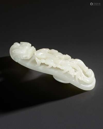 A LARGE WHITE JADE BELT HOOK