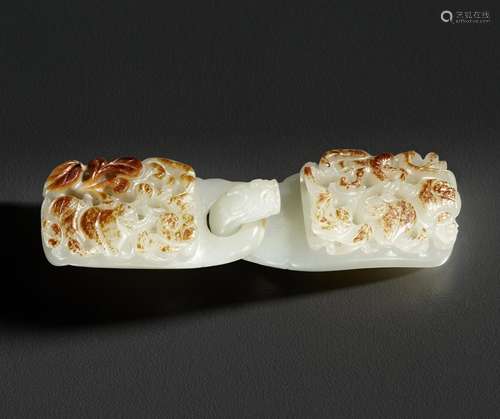 A WHITE AND RUSSET JADE TWO-PART BELT BUCKLE