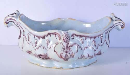 A European faience bowl probably 18th century with purple sc...
