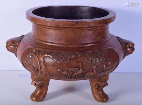 A huge Chinese bronze censer with beast head feet and handle...