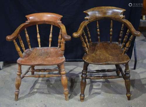 A pair of Victorian Oak and Elm smokers chairs 86 x 48 x 66c...