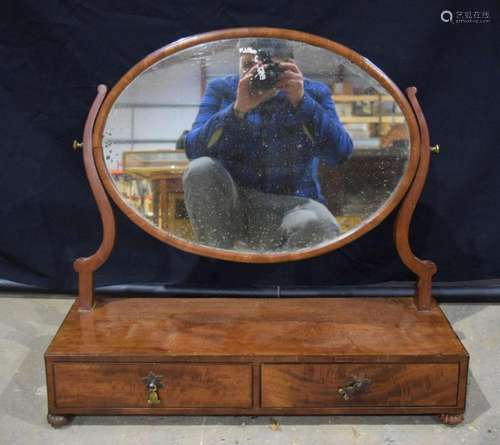 A large19th century mahogany dressing mirror, oval swing pla...