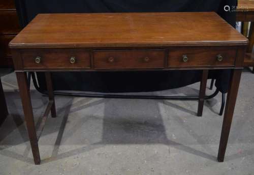 An antique mahogany sideboard with a single central door fla...