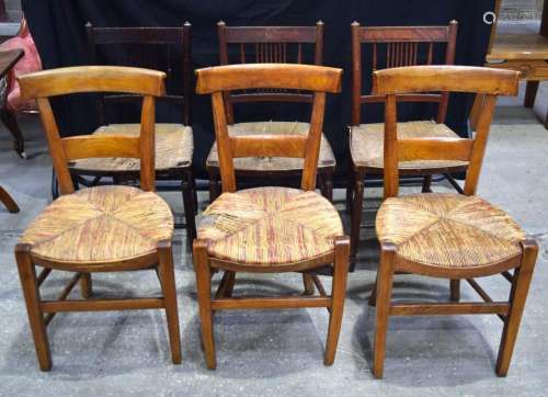 A collection of 6 antique Elm Chairs with reed seats 85 x 42...