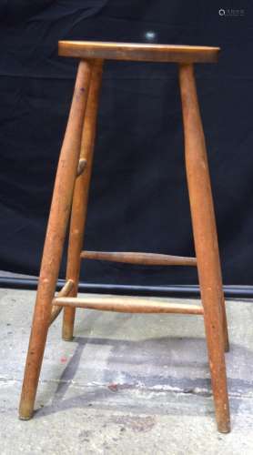 A vintage oak stool 76 x 42 x 39 cm.