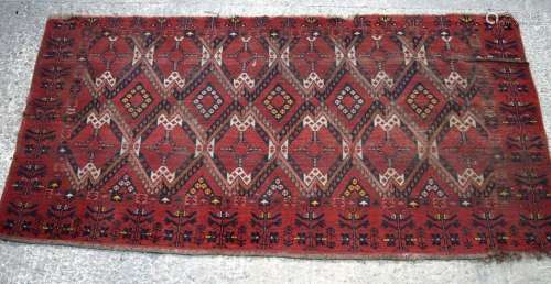 A large Caucasian rug 243 x 126 cm.