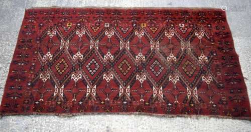 A large Caucasian rug 238 x 123 cm.