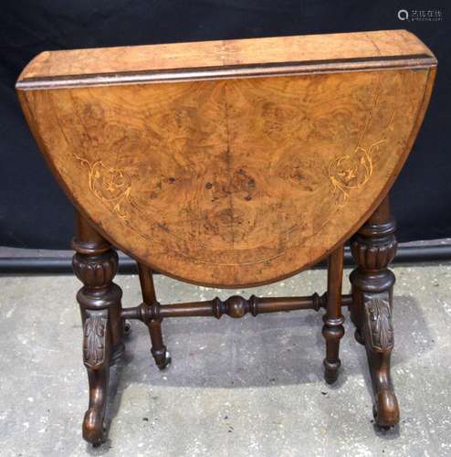 A Victorian walnut burr Sutherland table on turned baluster ...