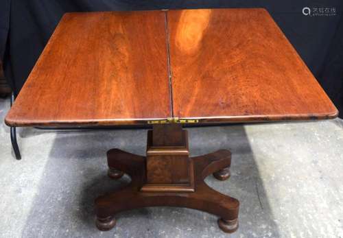 A Victorian carved mahogany pedestal drop leaf dining table ...