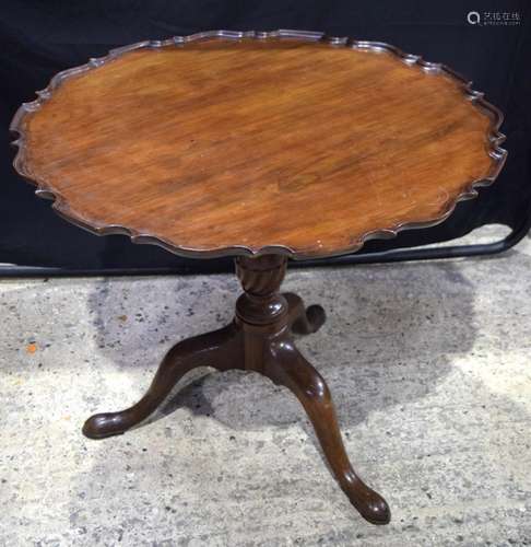 A Georgian mahogany pedestal occasional with carved raised e...