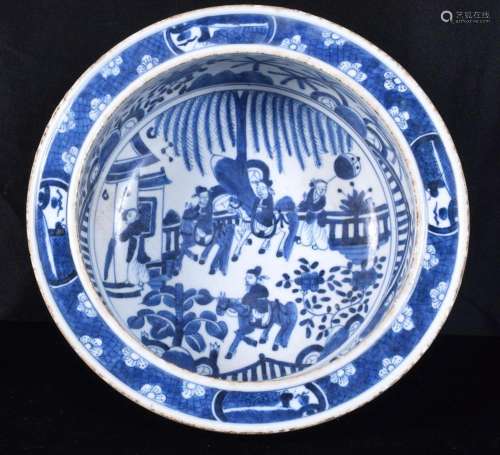 A Chinese porcelain blue and white bowl decorated with figur...