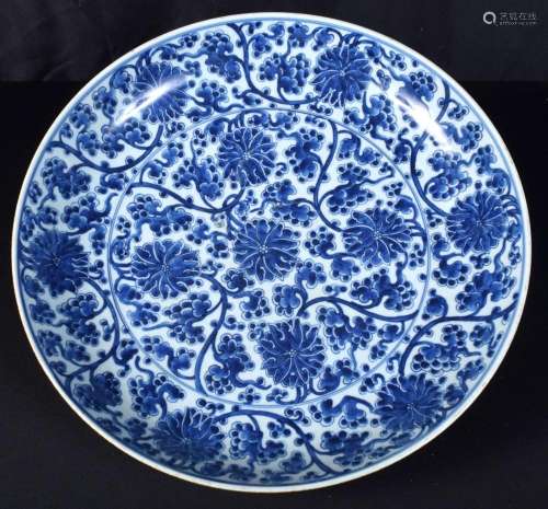 A large Chinese porcelain blue and white dish decorated with...