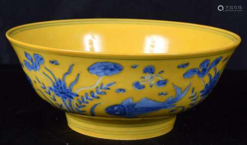 A Chinese porcelain yellow ground bowl decorated with fish a...