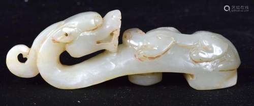 A Chinese carved Jade dragon buckle. 12cm