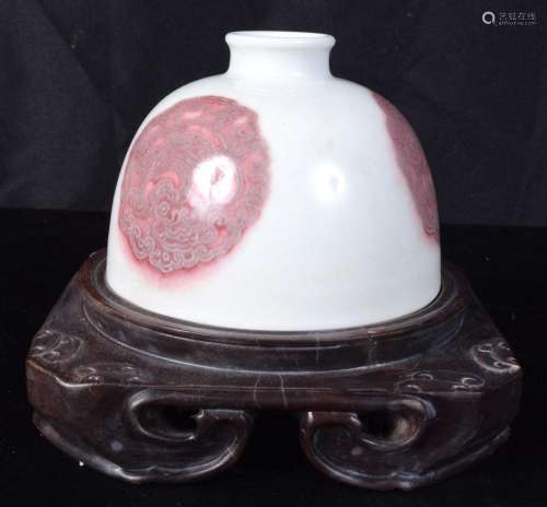 A Chinese porcelain Kangxi style under glazed red brush pot ...