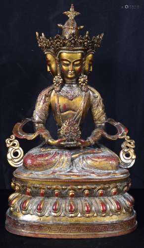 A Chinese/Tibetan gilt bronze Buddha. 40cm
