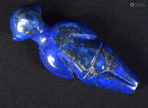 A carved Lapis Lazuli boulder in the shape of a person. 8cm