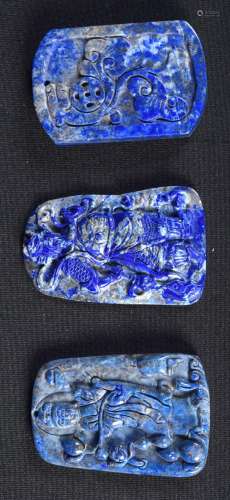 A collection of three carved Lapis Lazuli stones, two each d...