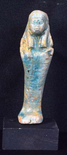 A small ceramic Egyptian Shabti figure. 10cm