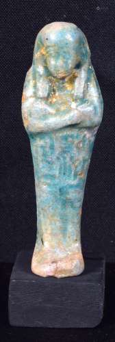 A small ceramic Egyptian Shabti figure. 9cm