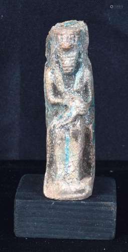 A small ceramic Egyptian Shabti figure. 8cm
