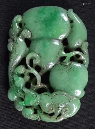 A carved Jade pendant in the form of a fruiting pod. 9 x 7cm