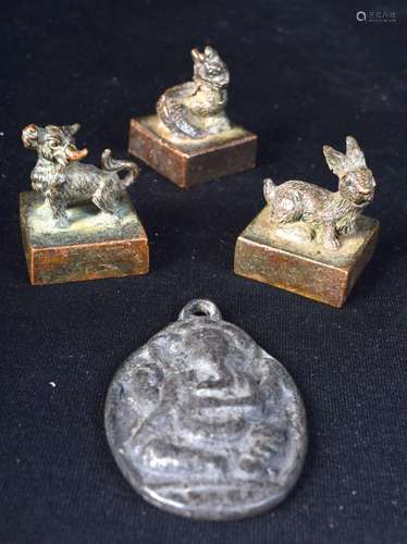 A collection of three Chinese bronze seals, together with an...