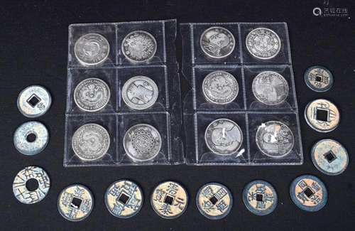 A collection of Chinese coins and tokens. (24)