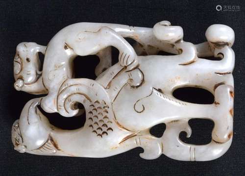 A carved white Jade boulder in the form of two beasts. 8 x 5...