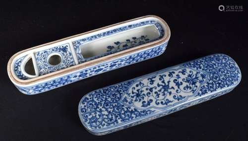 A Chinese porcelain blue and white lidded pen box decorated ...