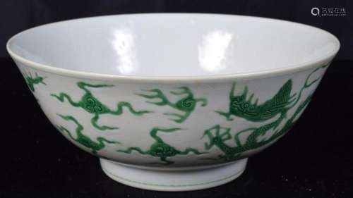 A small Chinese porcelain dragon bowl decorated in green rel...
