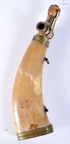 A 19th Century horn powder flask with Brass mounts 27 cm.
