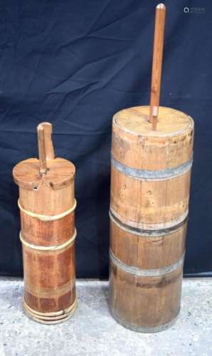 Two antique wooden butter churns 79 x 26 cm (2)