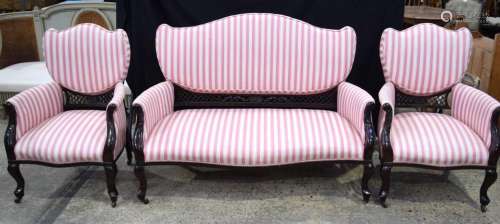 An Art Nouveau design pink and white upholstered salon suite...