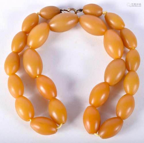 A set of Horn beads with a gold clasp 50cm .