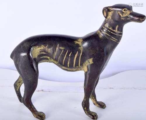 A small bronze model of a dog 14 x 16 cm .