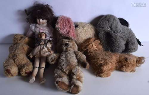 A collection of vintage teddy's , animals, dolls etc (7)