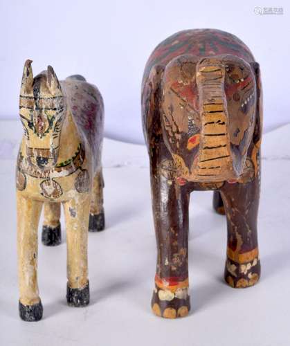 A South East Asian wooden Elephant together with a horse big...