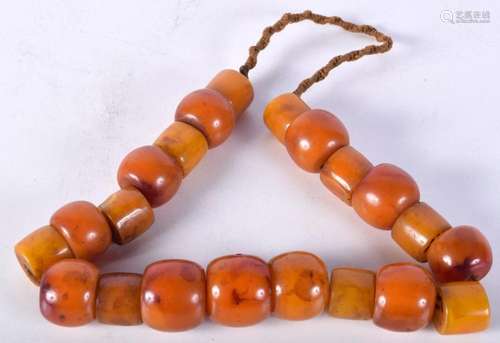 A set of large amber style beads 44cm.