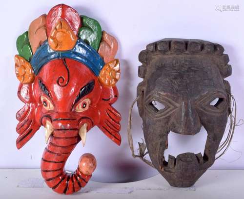 A Tibetan wooden mask together with another mask largest 31 ...