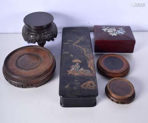 A collection of Chinese hardwood stands and a wooden lacquer...