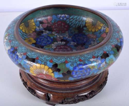 A 19th Century Chinese Cloisonne bowl decorated with flowers...