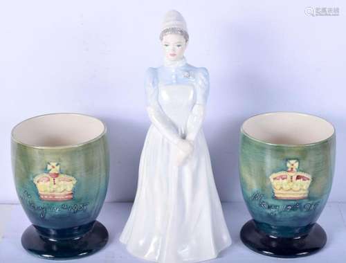 A pair of glazed cups stamped 1937 and a Coalport figure of ...