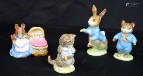 Four Beswick gold stamp figures. Largest 13cm high